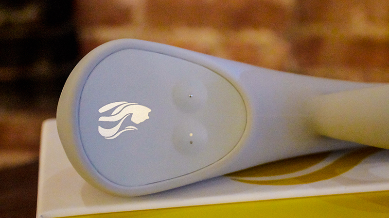 One button turns it on and the other adjusts vibration level.